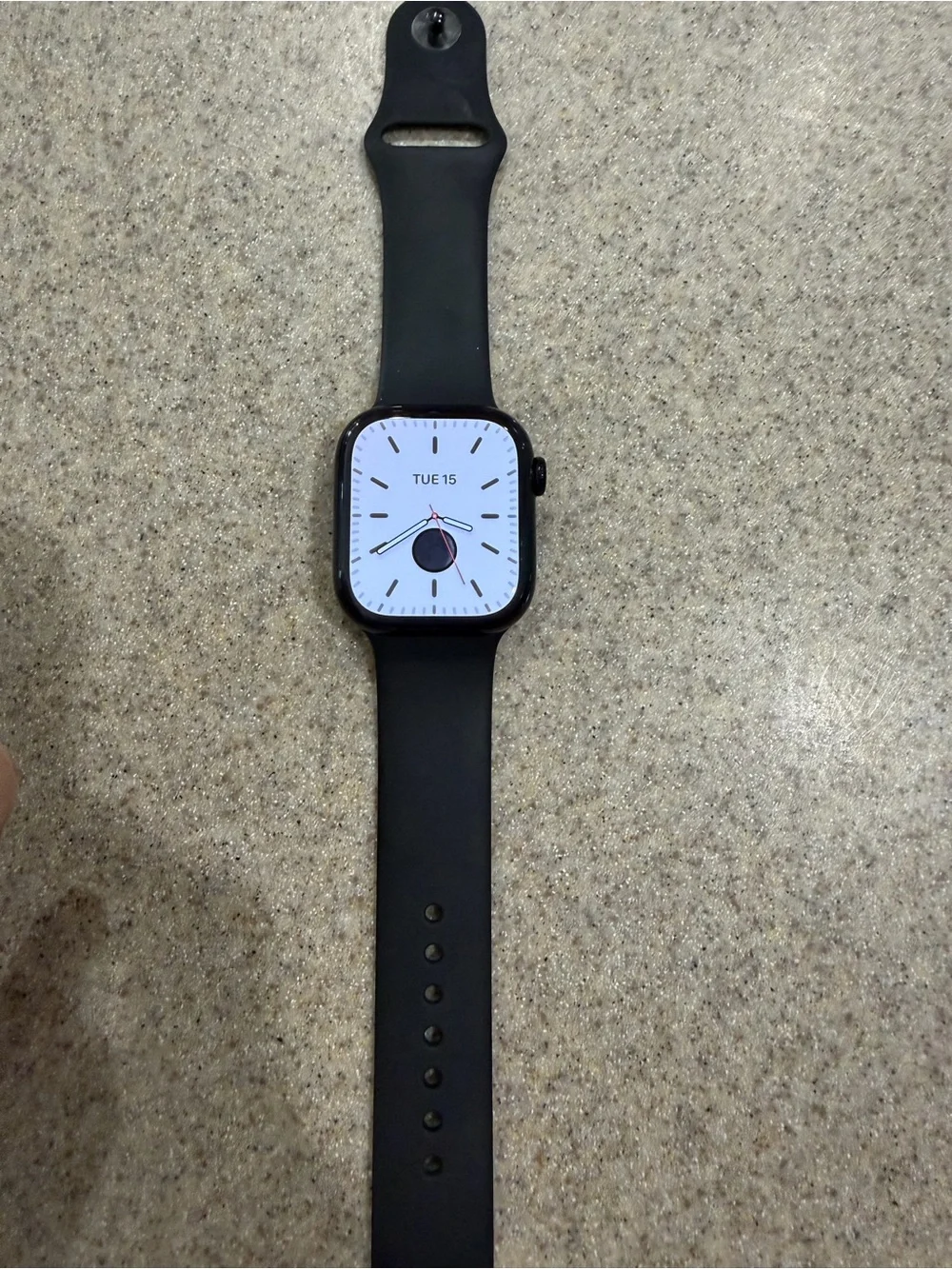 Apple Watch with Black Band and White Digital Face